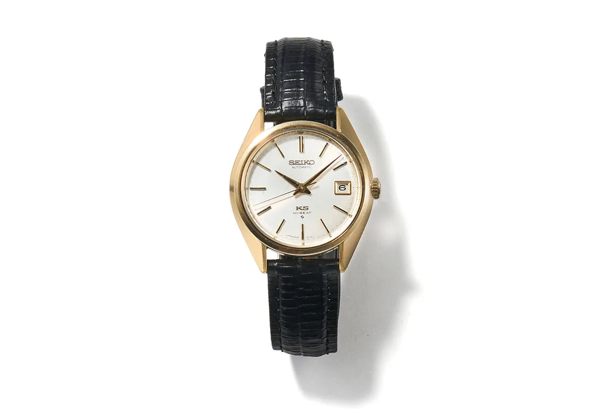 SEIKO watch with a leather belt and a gold frame