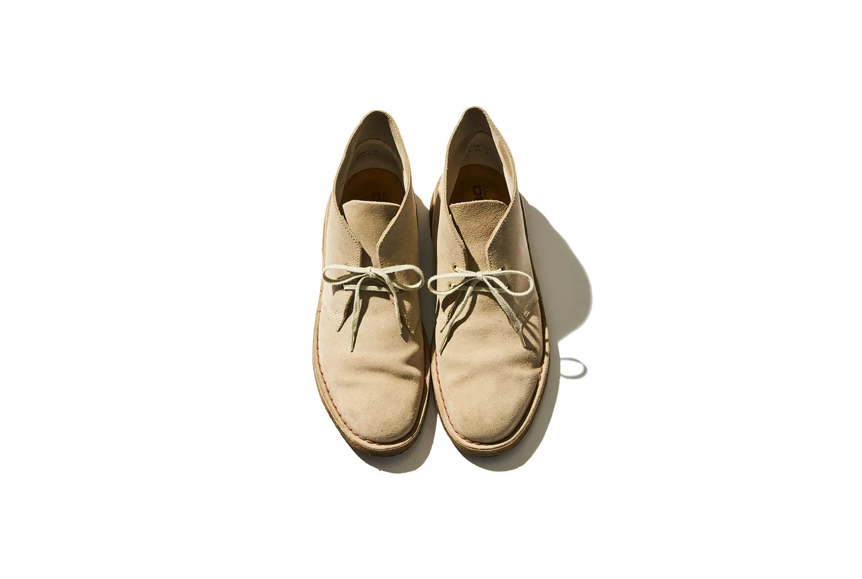 Tan Clarks boots with laces