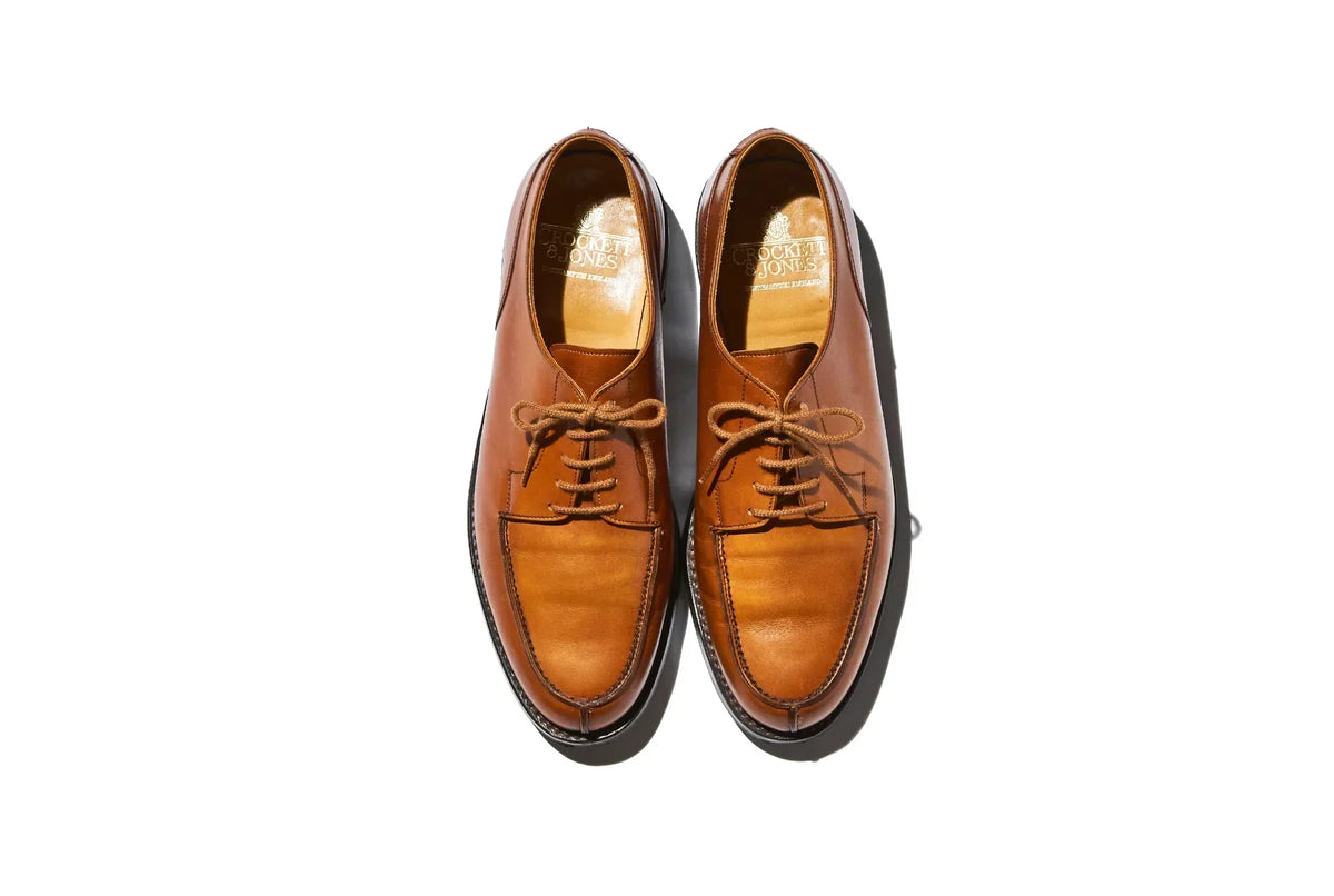 A pair of Crocket&Jones tan dress shoes
