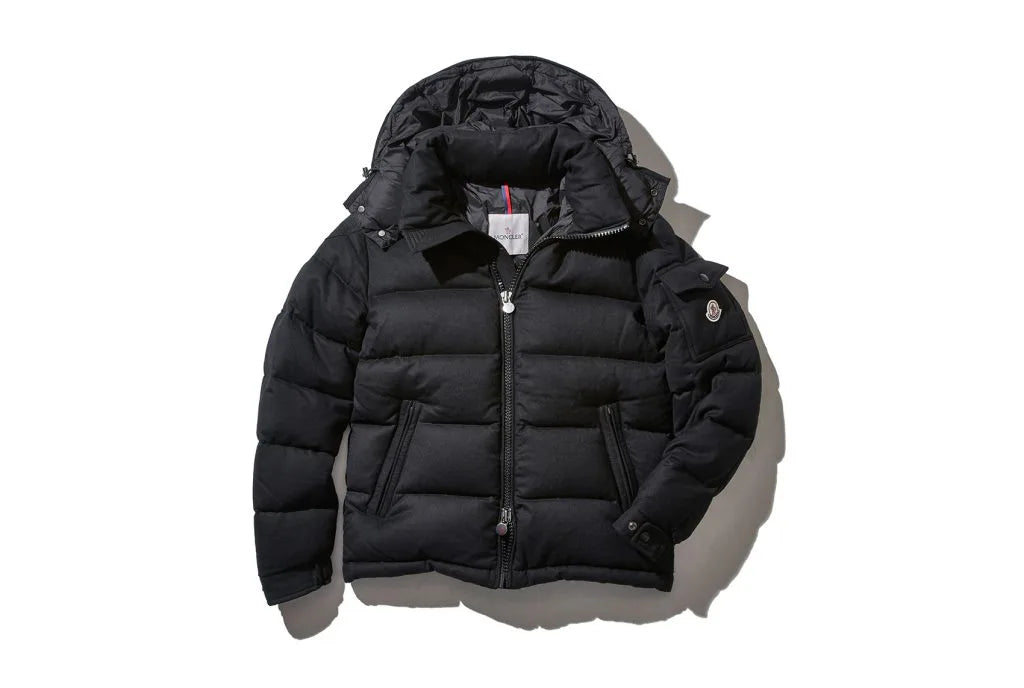 Black puffer jacket with a zipped front and a hoodie