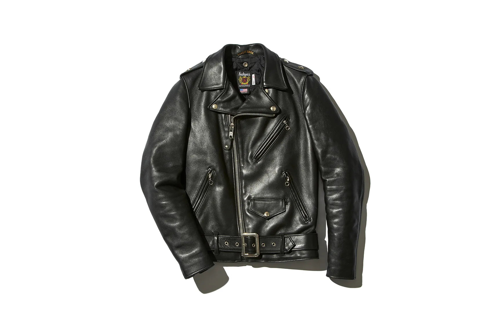 Black leather jacket with two zipper pocked on the left and right and a small button pocket