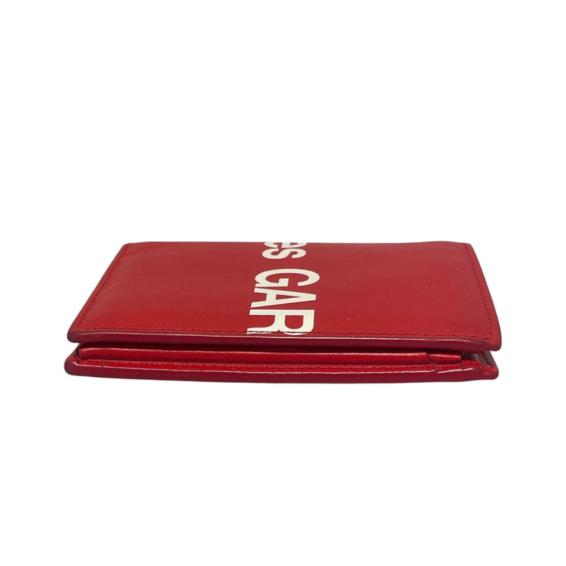 COMME des GARCONS/Bifold Wallet/Graphic/Leather/RED/COMME DES GARCON BOLD FONT