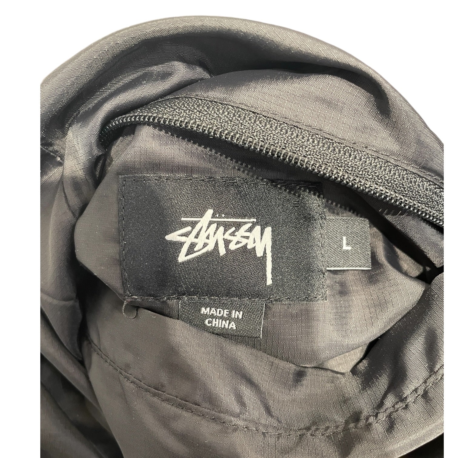 STUSSY/Puffer Jkt/L/Polyester/BLK/reversible puffer skull inside view 3