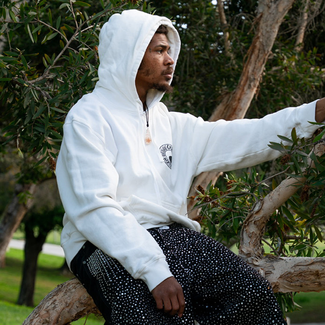 Stussy white sweatshirt on man model