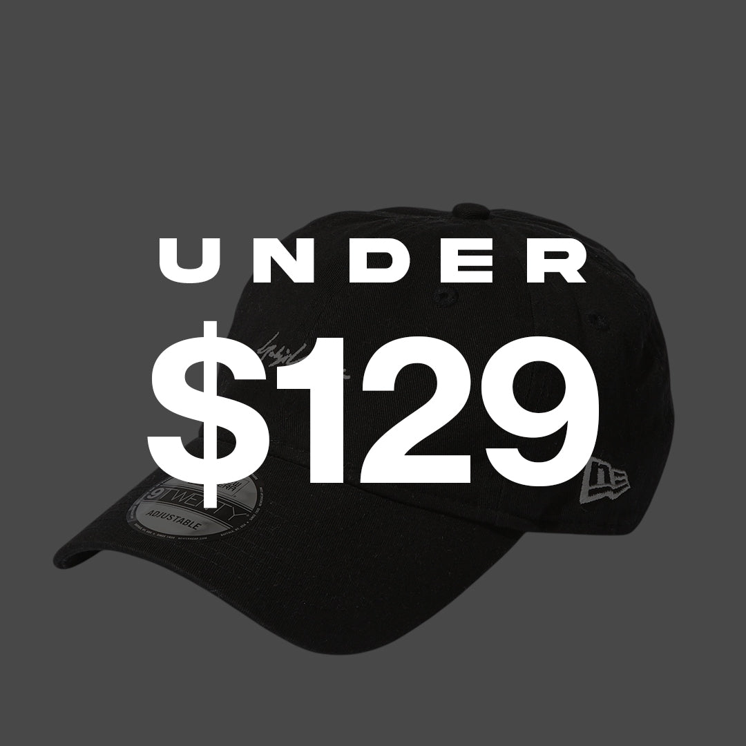 Black cap with 'UNDER $129' text on a gray background